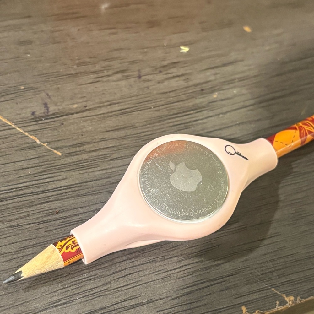 Apple Pink Pencil Grip with apple airtag